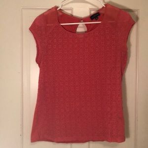 Salmon colored casual dress top.